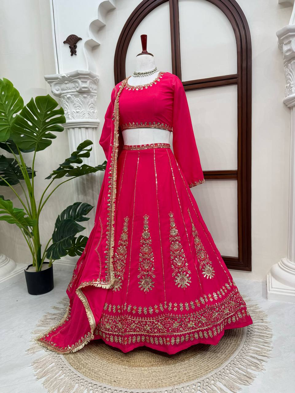 Radiant Rani Pink Silk Lehenga Choli Adorned with Opulent Heritage Floral Motifs and Intricate Zari Borders